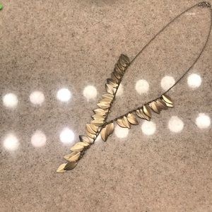 Gold feather necklace
